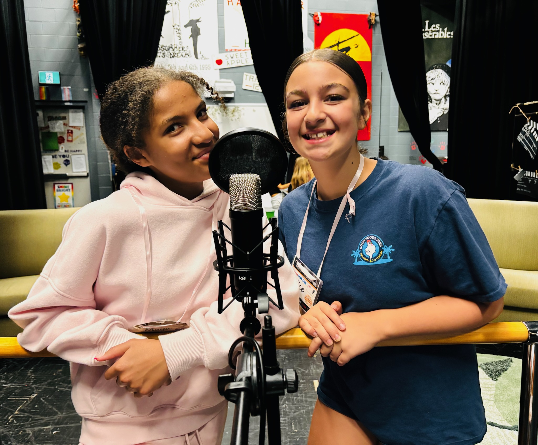 Two participants at the microphone